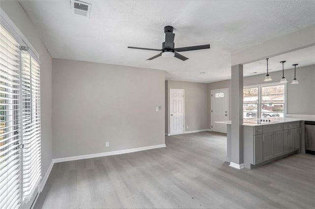2945 Catalina Dr, Decatur, GA 30032 - interior space featuring light countertops, gray cabinets, visible vents, and light wood-style floors