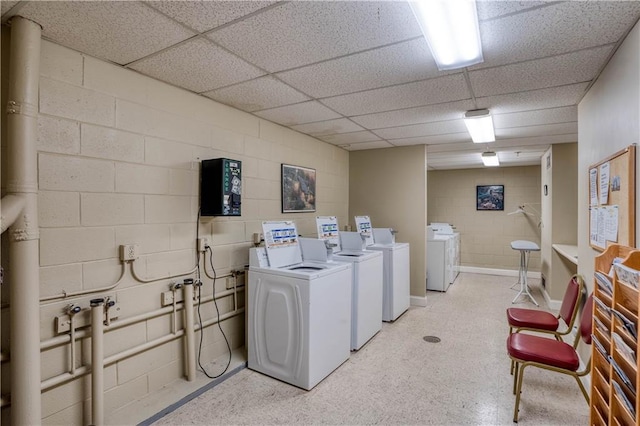 laundry room featuring washing machine and clothes dryer