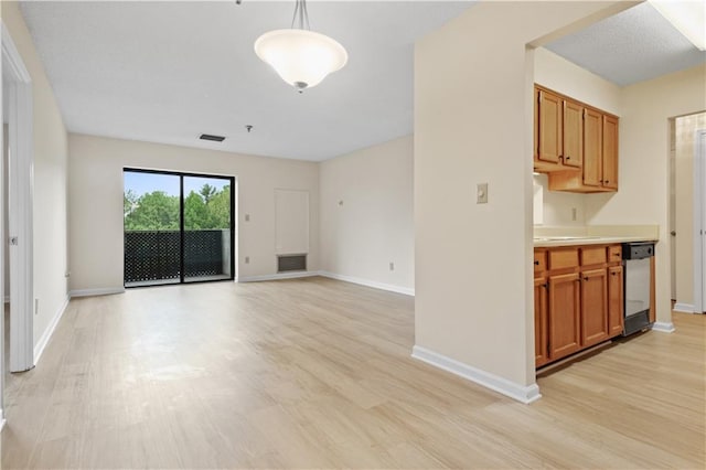 unfurnished living room with light hardwood / wood-style flooring