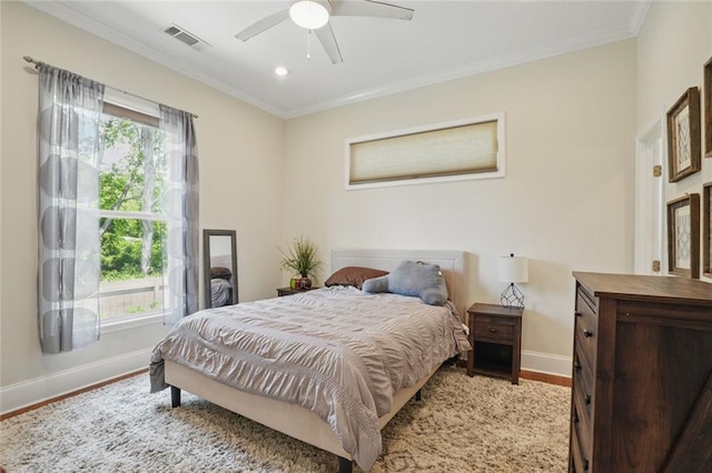 bedroom featuring baseboards, light wood-style flooring, ornamental molding, recessed lighting, and ceiling fan