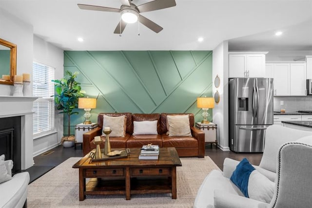 1098 Caruso Dr, Buford, GA 30518 - living area featuring recessed lighting, a decorative wall, ceiling fan, and dark wood-style floors