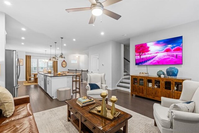 1098 Caruso Dr, Buford, GA 30518 - living room featuring ceiling fan, stairway, dark wood finished floors, and recessed lighting