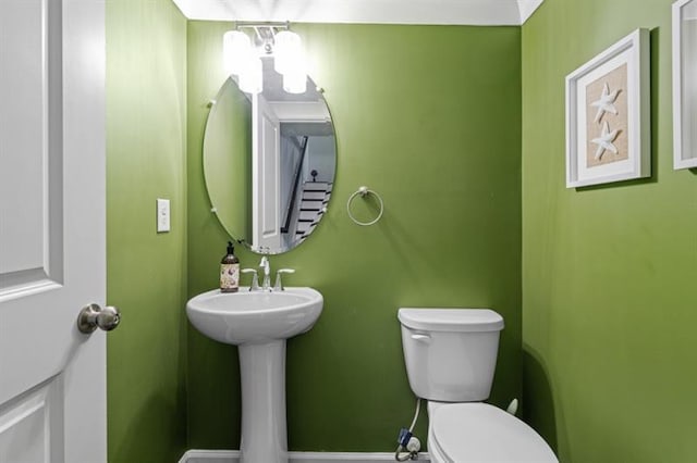 1098 Caruso Dr, Buford, GA 30518 - half bath featuring toilet and baseboards