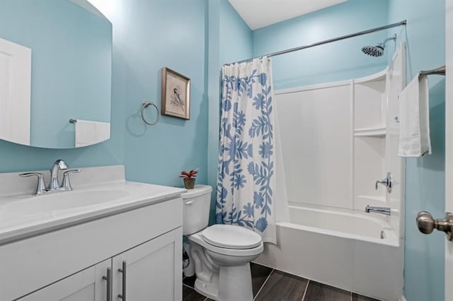 1098 Caruso Dr, Buford, GA 30518 - bathroom featuring vanity, toilet, shower / tub combo, and wood finished floors