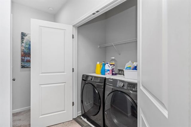 1098 Caruso Dr, Buford, GA 30518 - laundry room with laundry area, washer and clothes dryer, and baseboards