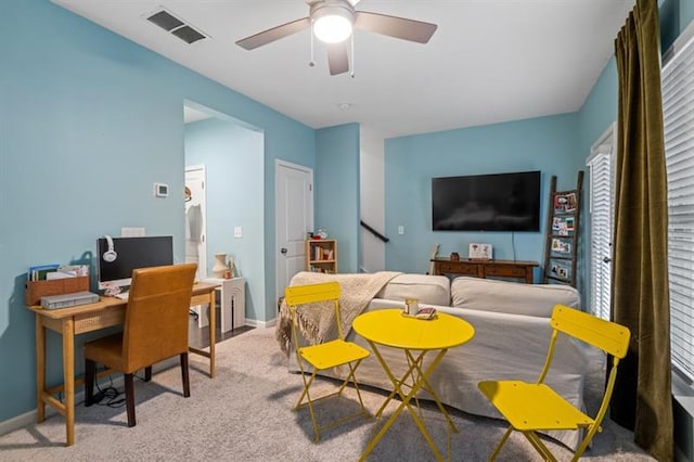 1098 Caruso Dr, Buford, GA 30518 - carpeted living area with ceiling fan, baseboards, and visible vents