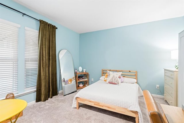 1098 Caruso Dr, Buford, GA 30518 - bedroom with light carpet and baseboards