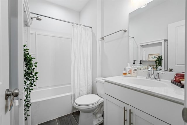 1098 Caruso Dr, Buford, GA 30518 - full bathroom with toilet, vanity, wood finished floors, and shower / bath combo