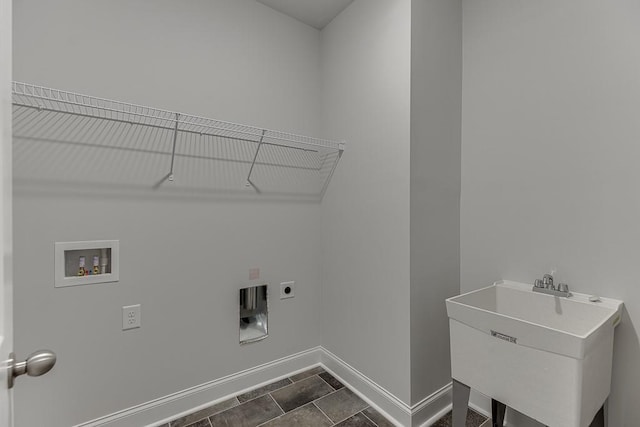 223 Montview Dr, Jefferson, GA 30549 - laundry area with baseboards, hookup for a washing machine, a sink, laundry area, and electric dryer hookup