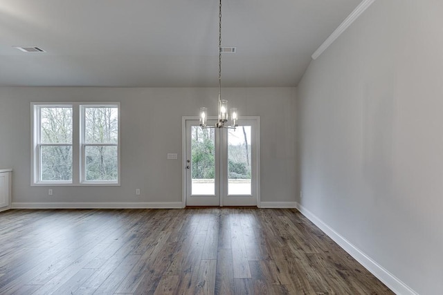 223 Montview Dr, Jefferson, GA 30549 - unfurnished dining area with an inviting chandelier, plenty of natural light, dark wood-style floors, and visible vents