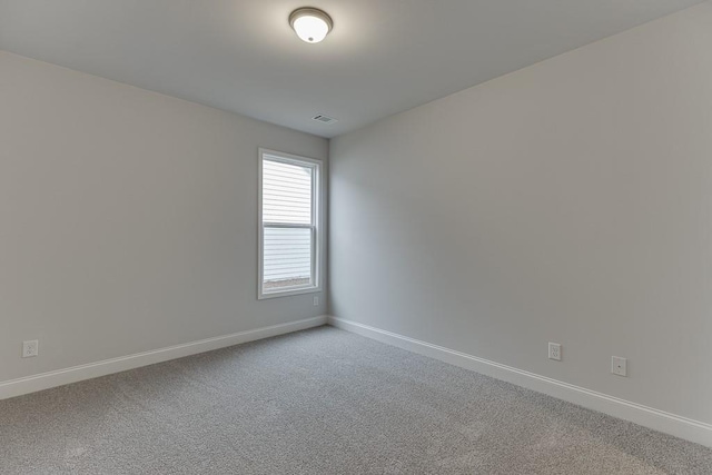 223 Montview Dr, Jefferson, GA 30549 - spare room with light colored carpet, visible vents, and baseboards