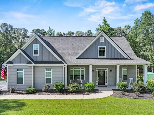 224 Blackthorn Rd, Colbert, GA 30628 - view of front of house featuring board and batten siding, roof with shingles, and a front yard