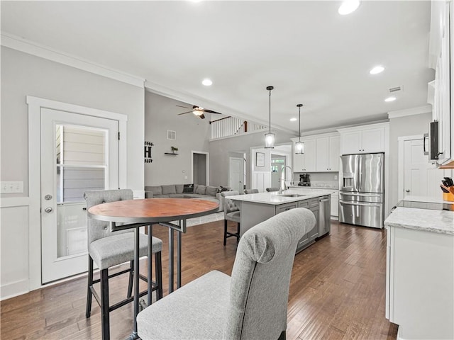 224 Blackthorn Rd, Colbert, GA 30628 - dining room featuring crown molding, recessed lighting, a ceiling fan, and dark wood-style flooring