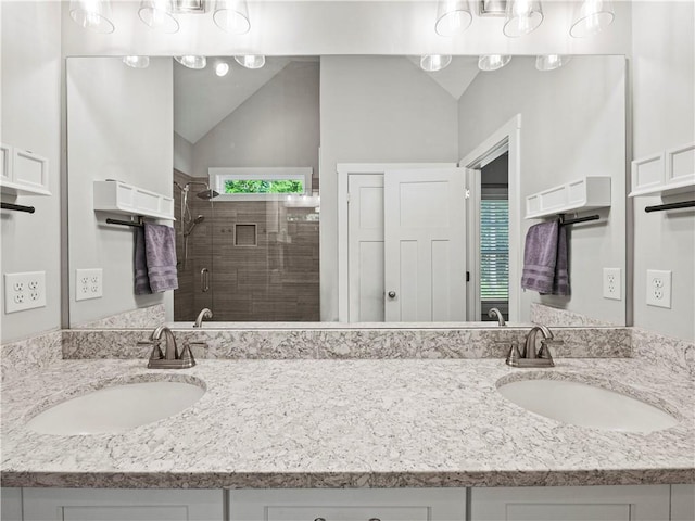 224 Blackthorn Rd, Colbert, GA 30628 - full bathroom featuring a shower stall, double vanity, and vaulted ceiling