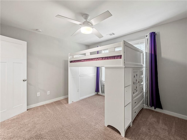 224 Blackthorn Rd, Colbert, GA 30628 - unfurnished bedroom featuring light colored carpet and a ceiling fan