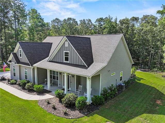 224 Blackthorn Rd, Colbert, GA 30628 - view of front facade featuring board and batten siding, covered porch, a front lawn, and a shingled roof