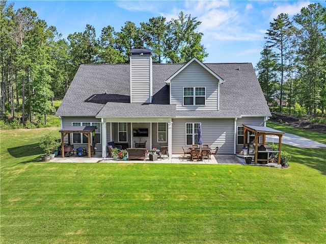 224 Blackthorn Rd, Colbert, GA 30628 - back of house featuring a pergola, a patio area, a yard, a chimney, and roof with shingles