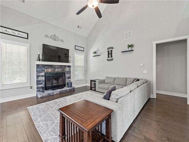 224 Blackthorn Rd, Colbert, GA 30628 - living area with ceiling fan, high vaulted ceiling, dark wood-style flooring, healthy amount of natural light, and a fireplace