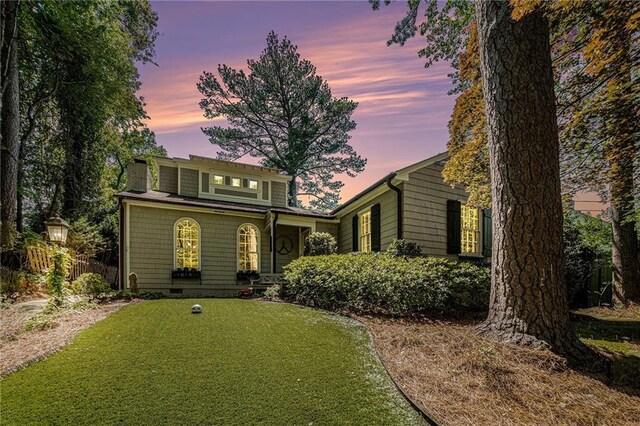 1634 Lenox Rd NE, Atlanta, GA 30306 - view of front of property featuring crawl space, a chimney, and a lawn
