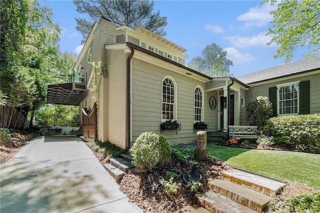 1634 Lenox Rd NE, Atlanta, GA 30306 - view of front of home with a front yard and brick siding