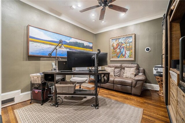 1634 Lenox Rd NE, Atlanta, GA 30306 - home office with wood finished floors, visible vents, a ceiling fan, crown molding, and baseboards