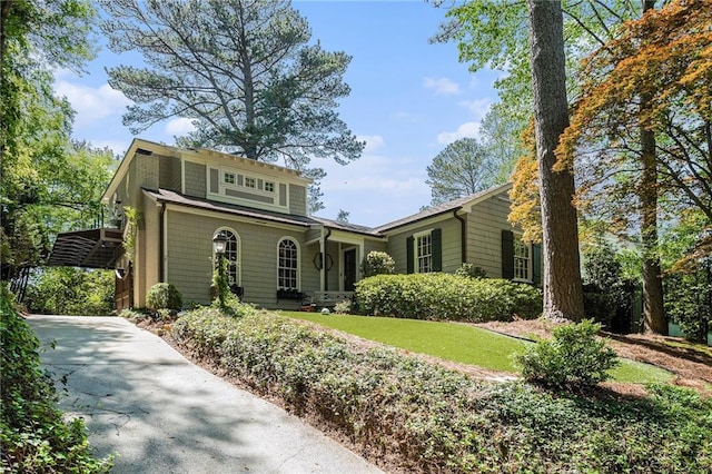 1634 Lenox Rd NE, Atlanta, GA 30306 - view of front facade featuring a front yard and driveway