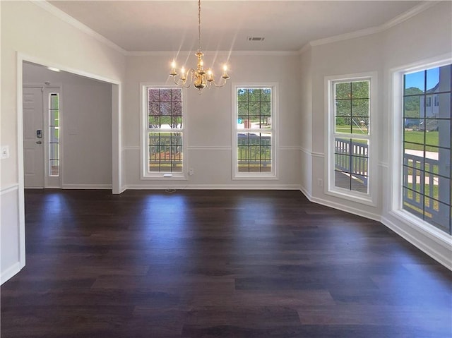 132 Lynnview Ct, Mcdonough, GA 30252 - unfurnished dining area with dark wood-style floors, a chandelier, healthy amount of natural light, crown molding, and baseboards