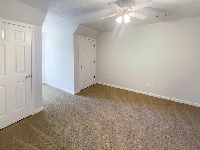 132 Lynnview Ct, Mcdonough, GA 30252 - additional living space featuring carpet, baseboards, a ceiling fan, and a textured ceiling