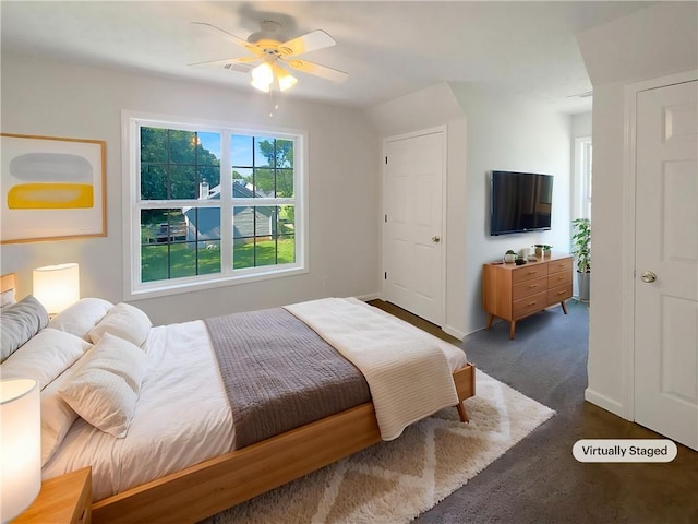 132 Lynnview Ct, Mcdonough, GA 30252 - bedroom featuring baseboards, ceiling fan, and dark carpet