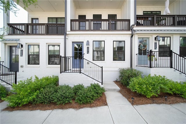 1247 Zucchini Cir SE, Atlanta, GA 30315 - property entrance featuring board and batten siding and brick siding