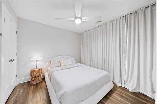1247 Zucchini Cir SE, Atlanta, GA 30315 - bedroom with wood finished floors, a ceiling fan, and baseboards