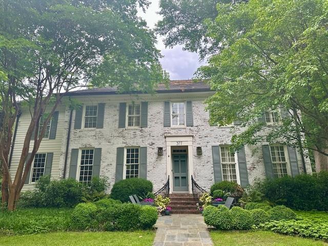 377 Camden Rd NE, Atlanta, GA 30309 - colonial-style house with brick siding and entry steps