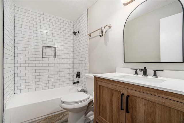 bathroom with toilet, shower / bathtub combination, and vanity
