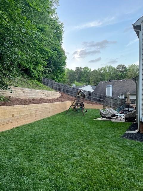 view of yard with a fenced backyard