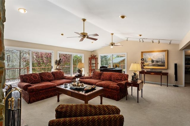 carpeted living room with vaulted ceiling