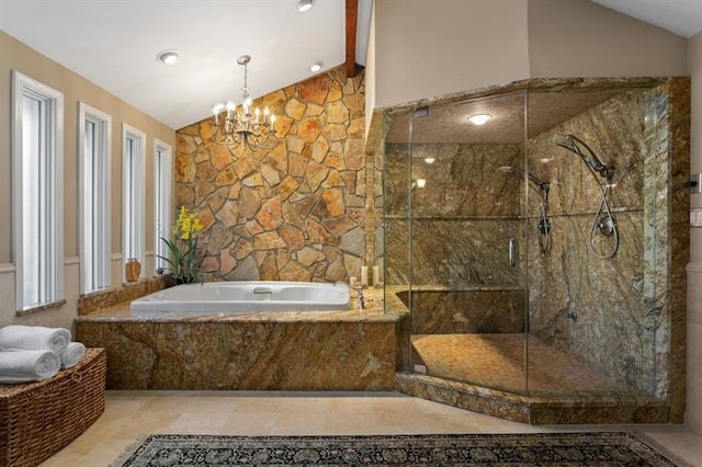 bathroom with a notable chandelier, lofted ceiling, and shower with separate bathtub