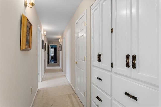 hallway with light carpet