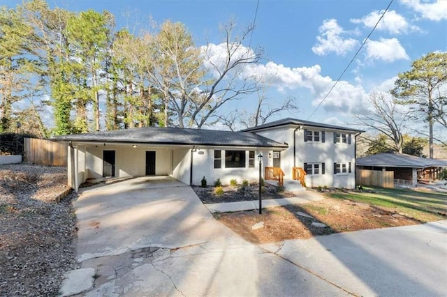 view of front of house featuring a carport