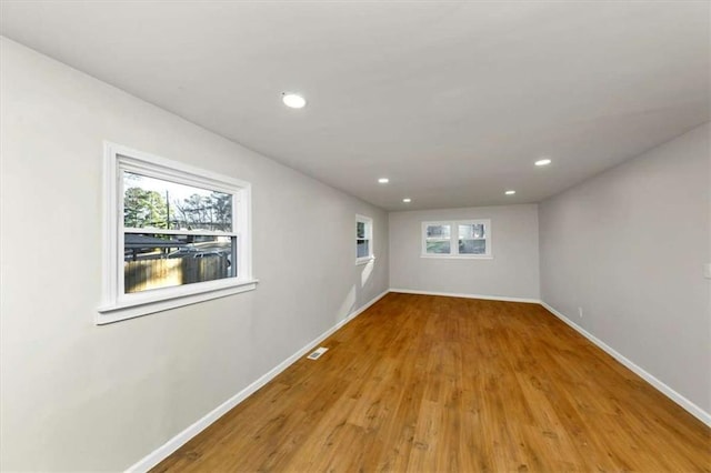 unfurnished room featuring light wood-type flooring