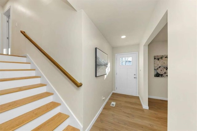 entrance foyer with light hardwood / wood-style floors