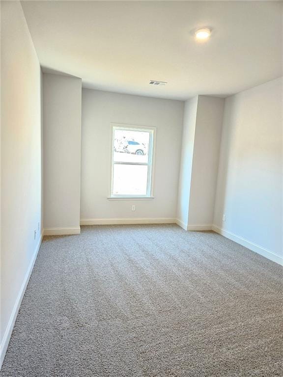 228 Trellis Walk, Macon, GA 31220 - empty room featuring light carpet and baseboards