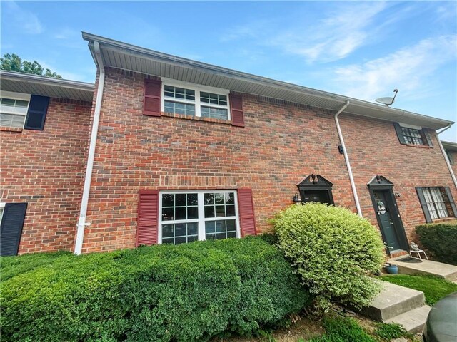 6354 Shannon Pkwy Unit 8B, Union City, GA 30291 - carpeted empty room featuring a textured ceiling and baseboards