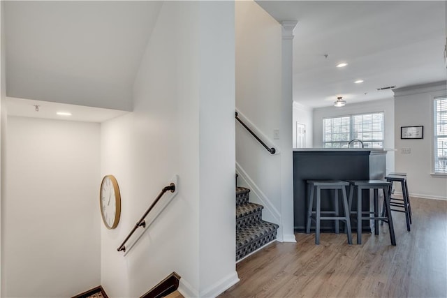 staircase featuring hardwood / wood-style flooring