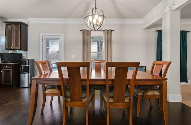 dining area featuring dark wood-type flooring, crown molding, and a chandelier