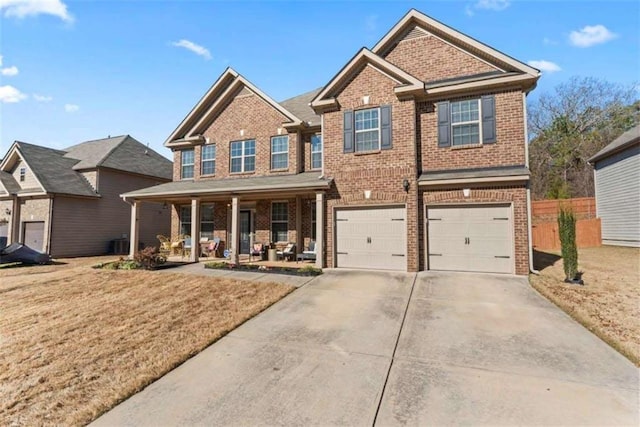 craftsman-style home featuring a garage, cooling unit, a front lawn, and a porch