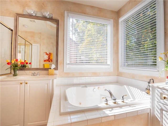 bathroom with vanity and plus walk in shower