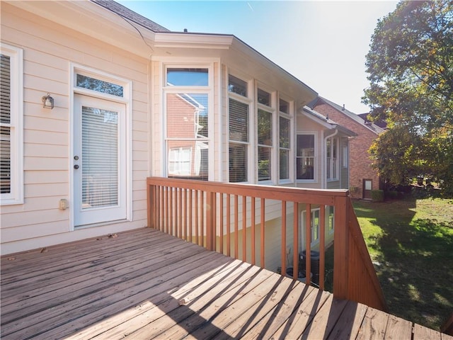 wooden deck with a yard