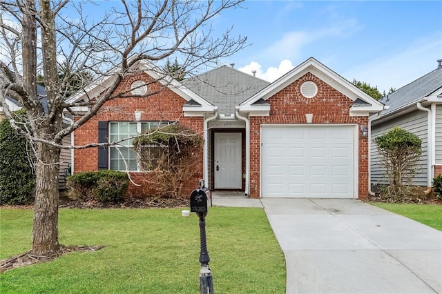 ranch-style house featuring a garage, driveway, brick siding, and a front lawn