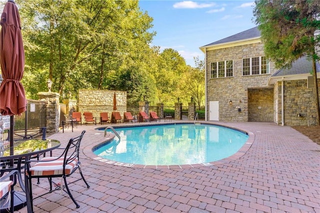 view of pool with a patio