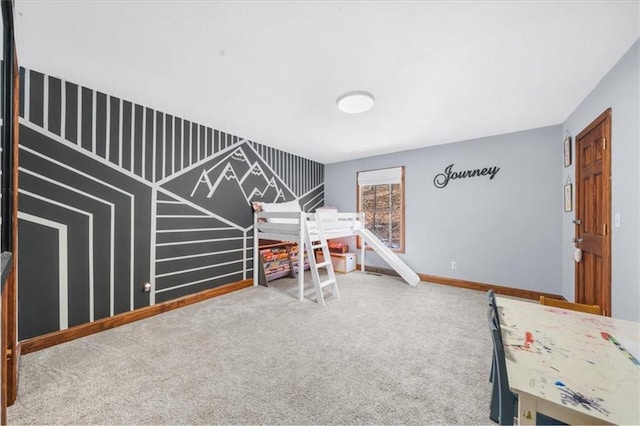 bedroom featuring carpet flooring and baseboards